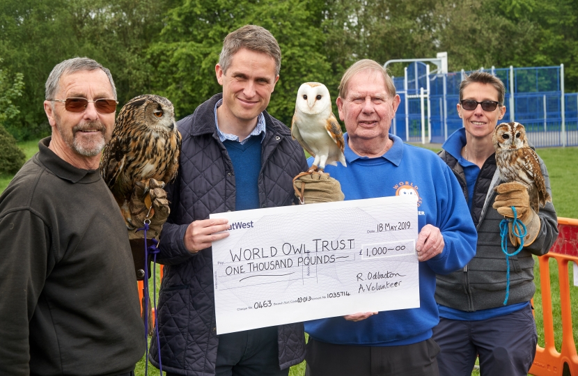 Gavin Williamson receives a cheque on behalf of the World Owl Trust