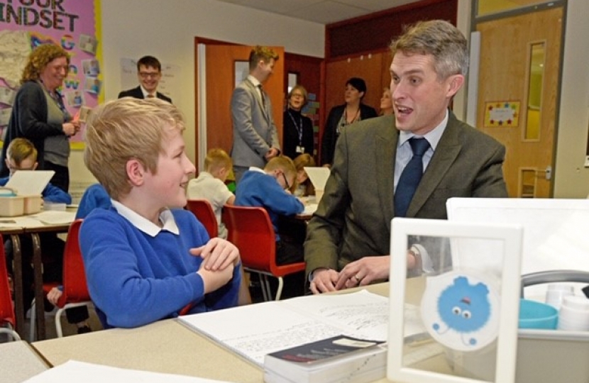 Gavin Williamson MP, chatting to pupils