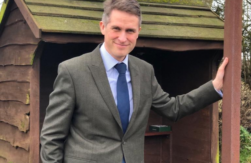 Gavin Williamson MP, standing outside the Himley bus stop