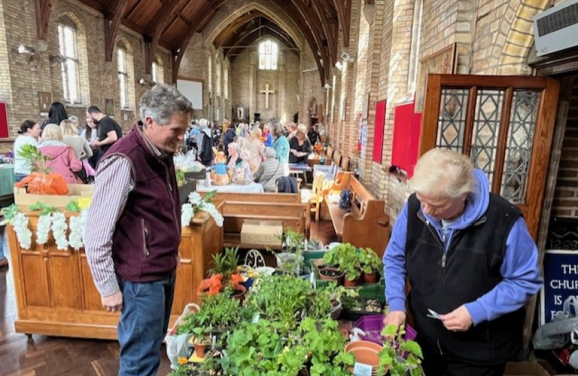 Sir Gavin Williamson attending the plant stall at the event