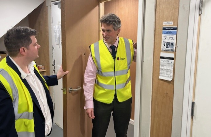 Sir Gavin Williamson takes part in a fire door assessment at the centre