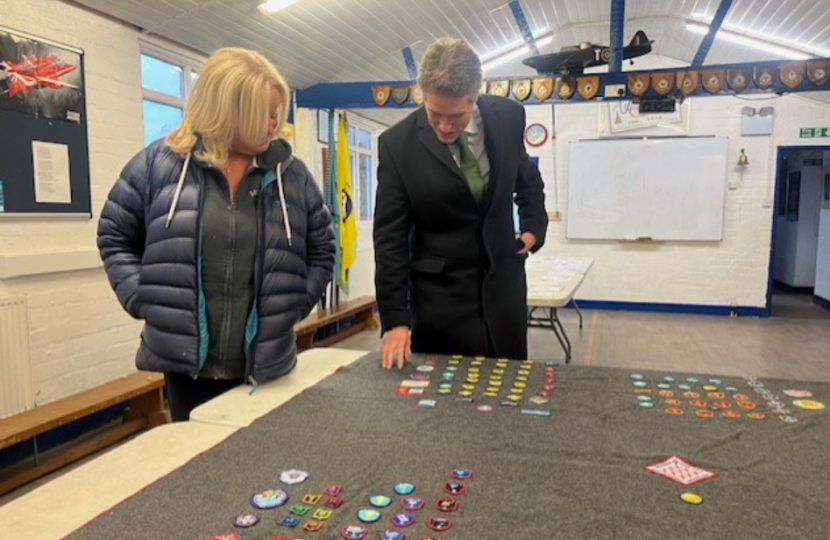 Sir Gavin Williamson judges badges for the design competition