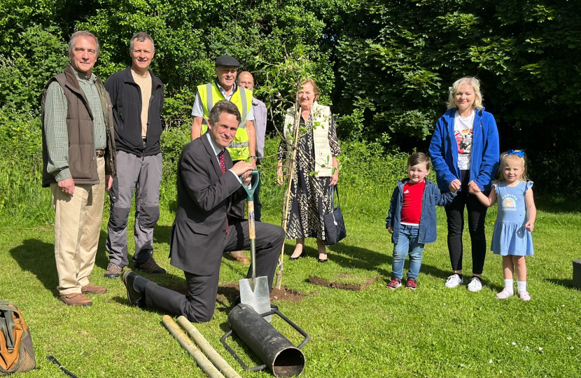 Sir Gavin Williamson and others planting tree
