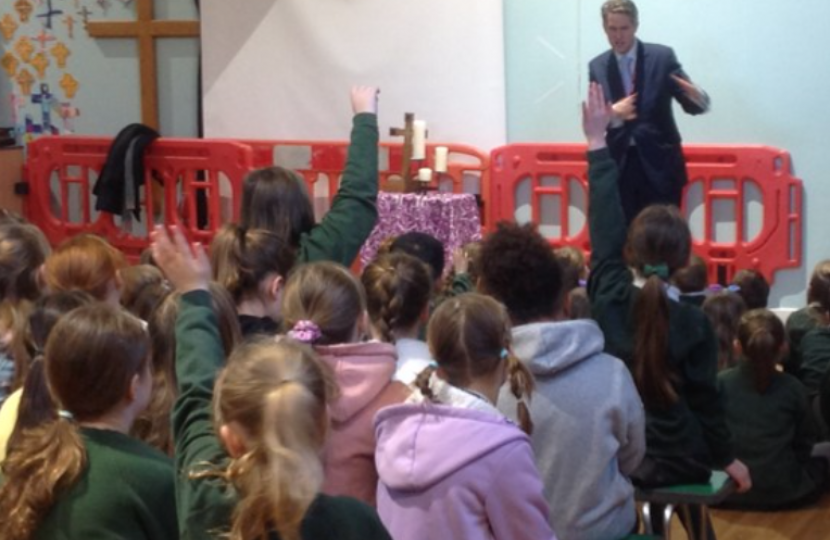 Sir Gavin Williamson is seen teaching the school children about the history of British democracy