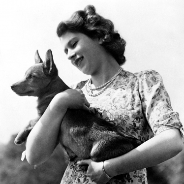 Photo of Young Queen Elizabeth II with a Corgi