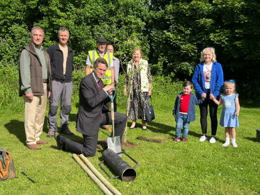 Sir Gavin Williamson and others planting tree