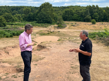 Sir Gavin Williamson MP (L) with Gary Pascoe, Staffordshire Wildlife Trust's Highgate Common Officer