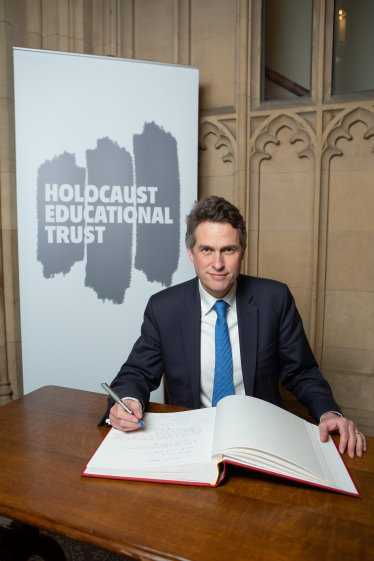Sir Gavin Williamson MP signing the Holocaust Educational Trust Book of Commitment