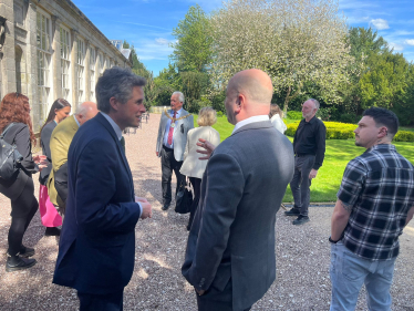 Sir Gavin Williamson is joined by trustees and volunteers from the Orangery